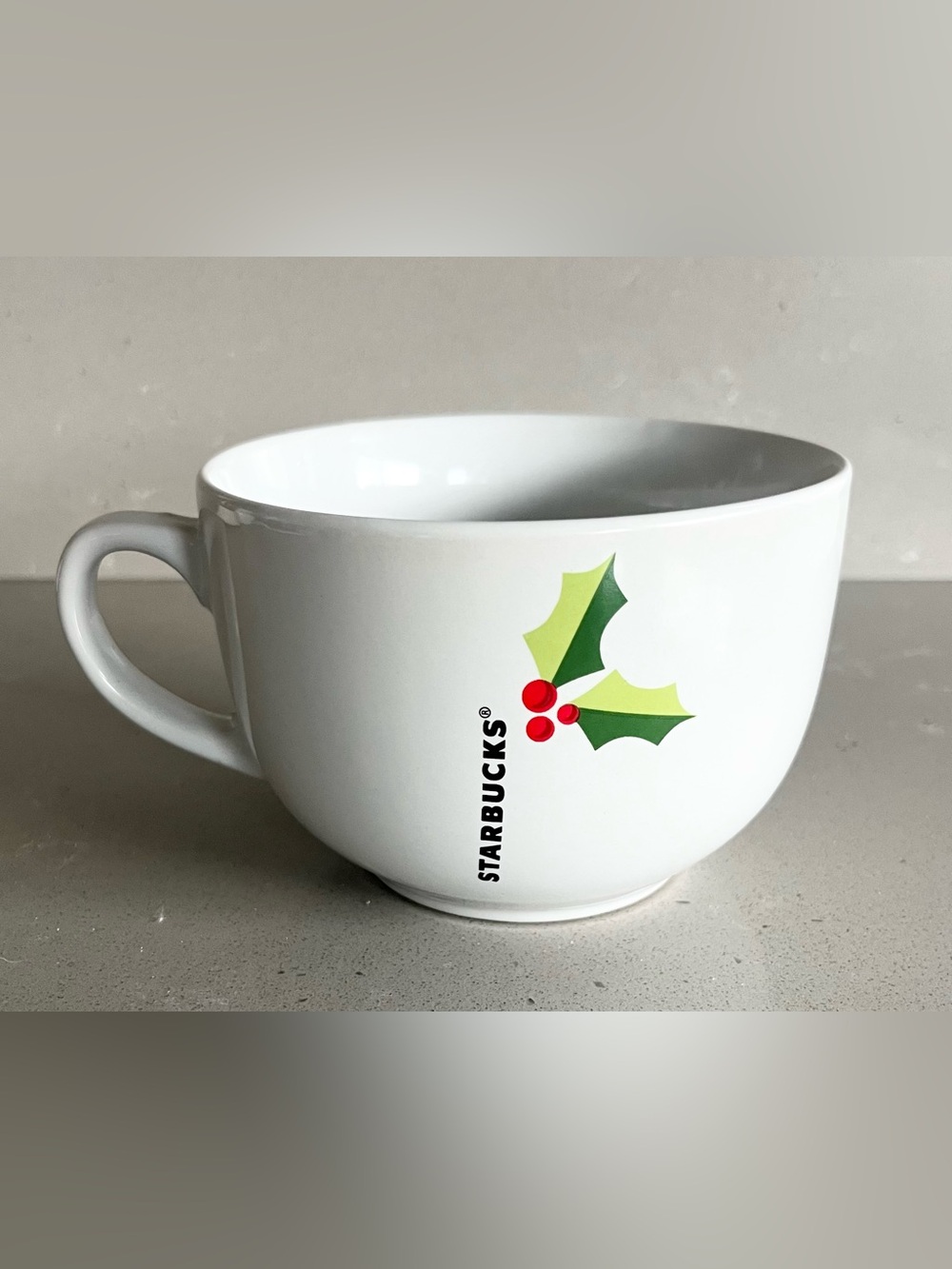Starbucks holiday mug is in excellent condition. White oversized mug reads STARB